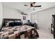 Spacious bedroom with a bed, desk, and plenty of natural light at 1099 Saltgrass Way, Myrtle Beach, SC 29588