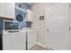 Laundry room with washer, dryer, and ample storage at 1099 Saltgrass Way, Myrtle Beach, SC 29588