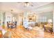 Open concept living area with hardwood floors, and access to kitchen and dining at 5102 Sweetwater Blvd., Murrells Inlet, SC 29576