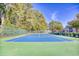 Well-maintained tennis court for residents' recreational use at 5102 Sweetwater Blvd., Murrells Inlet, SC 29576