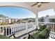 Private balcony with seating and community views at 4878 Dahlia Ct. # 24-304, Myrtle Beach, SC 29577