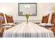 Dining room featuring a wood table set for four with a striped runner at 4878 Dahlia Ct. # 24-304, Myrtle Beach, SC 29577