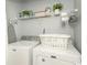 Laundry room with washer, dryer, and shelving at 4878 Dahlia Ct. # 24-304, Myrtle Beach, SC 29577