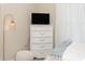Bedroom with dresser, floor lamp and TV at 4878 Dahlia Ct. # 24-304, Myrtle Beach, SC 29577