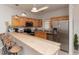 Modern kitchen with stainless steel appliances and light wood cabinets at 4878 Dahlia Ct. # 24-304, Myrtle Beach, SC 29577