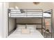 Gray metal bunk bed with white bedding at 4878 Dahlia Ct. # 24-304, Myrtle Beach, SC 29577