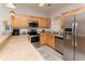 Modern kitchen with stainless steel appliances and light wood cabinets at 4878 Dahlia Ct. # 24-304, Myrtle Beach, SC 29577