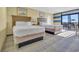 Bright bedroom featuring two double beds and ocean views at 2311 S Ocean Blvd. # 139, Myrtle Beach, SC 29577