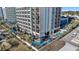 Aerial view of oceanfront property with multiple pools and beach access at 2311 S Ocean Blvd. # 139, Myrtle Beach, SC 29577