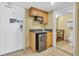 Small kitchenette with microwave, mini-fridge, and sink at 2311 S Ocean Blvd. # 139, Myrtle Beach, SC 29577