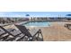 Relaxing pool area with multiple lounge chairs and ocean view at 2311 S Ocean Blvd. # 139, Myrtle Beach, SC 29577