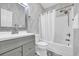 Bathroom with shower/tub combo, vanity, and patterned wallpaper at 612 River Oaks Dr. # 55D, Myrtle Beach, SC 29579