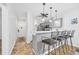 Modern kitchen with gray cabinets, stainless steel appliances, and breakfast bar at 612 River Oaks Dr. # 55D, Myrtle Beach, SC 29579