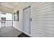 Private condo entry with exterior door, balcony, and green shutters at 612 River Oaks Dr. # 55D, Myrtle Beach, SC 29579