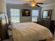 Bright bedroom featuring a king-size bed and ample natural light at 1060 Fairway Ln. # 1060, Conway, SC 29526