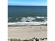 Stunning panoramic view of the ocean and beach from a high-rise balcony at 2201 S Ocean Blvd. # 1404, Myrtle Beach, SC 29577