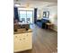 Living room features ocean view, sofa, and kitchen island at 2201 S Ocean Blvd. # 1404, Myrtle Beach, SC 29577