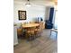Dining area with an oval table and chairs, offering a bright and airy space at 2201 S Ocean Blvd. # 1404, Myrtle Beach, SC 29577