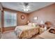 Bedroom with a queen bed, neutral decor, and ceiling fan at 2226 Huntington Dr. # D, Surfside Beach, SC 29575