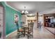 Dining area with glass table and view of kitchen at 2226 Huntington Dr. # D, Surfside Beach, SC 29575