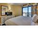 Comfortable bedroom with king bed and ocean view at 7100 Ocean Blvd. N # 825, Myrtle Beach, SC 29572