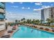 Resort-style pool with plenty of lounge chairs at 7100 Ocean Blvd. N # 825, Myrtle Beach, SC 29572