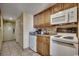 Clean kitchen with wood cabinets and appliances at 7100 Ocean Blvd. N # 825, Myrtle Beach, SC 29572