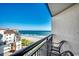 Balcony view of the ocean with two chairs at 7100 Ocean Blvd. N # 825, Myrtle Beach, SC 29572
