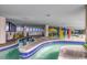Relaxing indoor pool and kiddie area with colorful features at 7100 Ocean Blvd. N # 825, Myrtle Beach, SC 29572