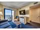 Living room with ocean view, comfy seating, and TV at 7100 Ocean Blvd. N # 825, Myrtle Beach, SC 29572