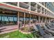 Oceanfront patio with seating area and beautiful landscaping at 7100 Ocean Blvd. N # 825, Myrtle Beach, SC 29572