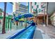 A blue water slide for hours of splashing fun in the sun at 7100 Ocean Blvd. N # 825, Myrtle Beach, SC 29572