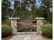 Warner Crossing community entrance with stone pillars and landscaping at 420 Ribbon Rail Way, Loris, SC 29569