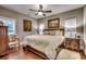 Large main bedroom with a king-size bed and hardwood floors at 713 Shell Point Ct., Longs, SC 29568