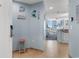 Beach-themed condo entryway with ocean view at 300 N Ocean Blvd. # 128, North Myrtle Beach, SC 29582