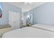 Guest bedroom with two double beds and closet at 300 N Ocean Blvd. # 128, North Myrtle Beach, SC 29582