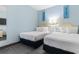 Guest bedroom with two double beds at 300 N Ocean Blvd. # 128, North Myrtle Beach, SC 29582