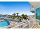 Balcony view of the ocean, pool, and resort amenities at 300 N Ocean Blvd. # 128, North Myrtle Beach, SC 29582