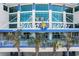 Avista Resort building exterior with palm trees at 300 N Ocean Blvd. # 128, North Myrtle Beach, SC 29582