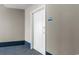 White condo entry door with number 128 at 300 N Ocean Blvd. # 128, North Myrtle Beach, SC 29582