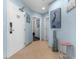 Condo entryway with coastal decor and hallway access at 300 N Ocean Blvd. # 128, North Myrtle Beach, SC 29582