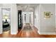 Hardwood floor entryway with views into living room and additional rooms at 4491 Horseshoe Bend, Murrells Inlet, SC 29576
