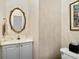 Elegant powder room with ornate mirror at 4491 Horseshoe Bend, Murrells Inlet, SC 29576