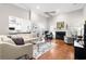 Spacious living room features hardwood floors, fireplace, and ample natural light at 4491 Horseshoe Bend, Murrells Inlet, SC 29576