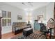 Bedroom with a futon, desk, and large window at 4491 Horseshoe Bend, Murrells Inlet, SC 29576