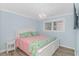 Main bedroom with a king-size bed and TV at 6001 - 8016 S Kings Hwy., Myrtle Beach, SC 29575