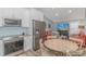 Modern kitchen with stainless steel appliances and a breakfast nook at 6001 - 8016 S Kings Hwy., Myrtle Beach, SC 29575