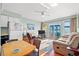 Living room with sofa, dining area, ocean view at 301 N Waccamaw Dr. # 206, Murrells Inlet, SC 29576