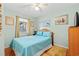 Cozy bedroom with a comfortable double bed at 301 N Waccamaw Dr. # 206, Murrells Inlet, SC 29576