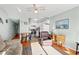Bright living room with comfy seating and access to kitchen at 301 N Waccamaw Dr. # 206, Murrells Inlet, SC 29576